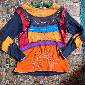 Rising international x-large long sleeve tee.